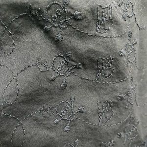 2XL black high low dress with skull and cross bones stitching and lace cutouts